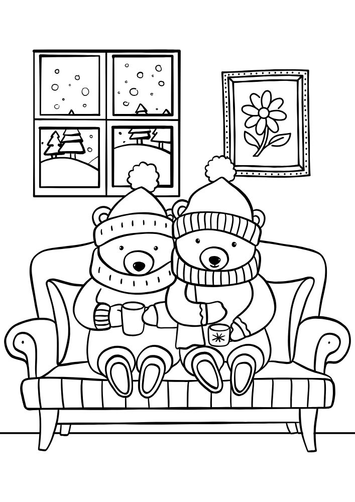 A winter coloring page with two bears sitting on a couch drinking hot cocoa