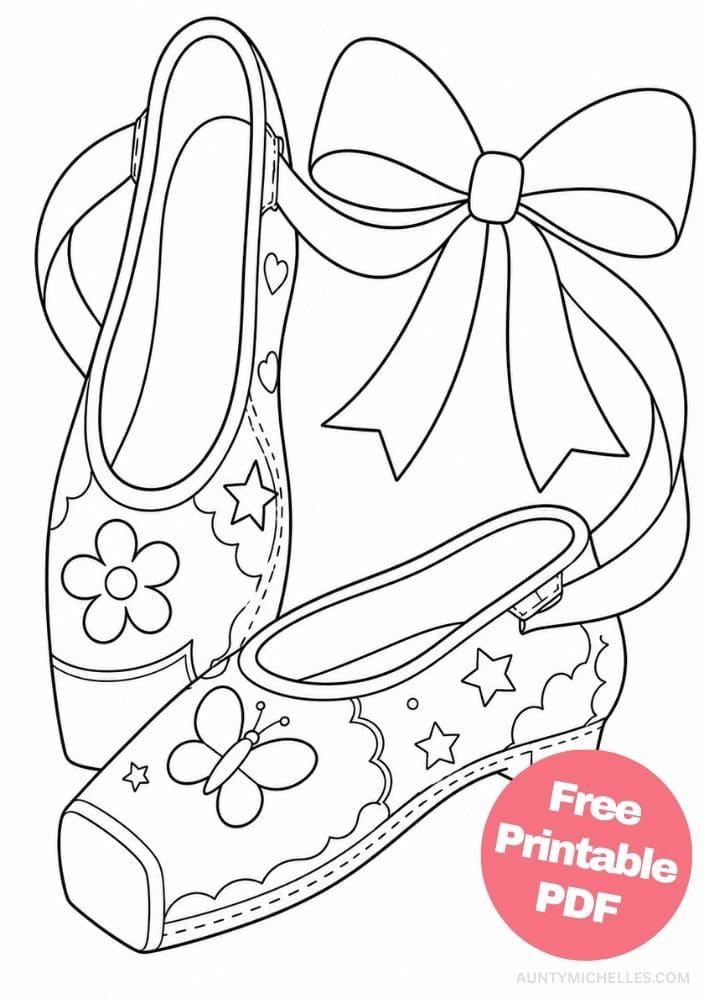 Pair of decorative pointe shoes with flowers, butterflies, stars, hearts, and a large ribbon bow